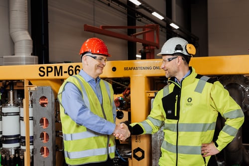 Alistair Geddes, COO of Expro, shaking hands with Kjetil Lunde, CEO of Enhanced Drilling. Alistair Geddes, COO of Expro, shaking hands with Kjetil Lunde, CEO of Enhanced Drilling.